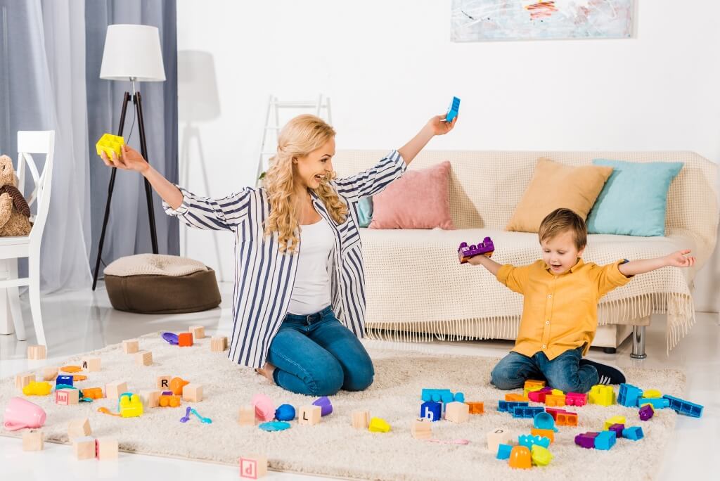 Mom Sitting And Enjoying With Her Child