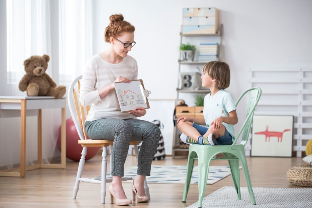 Mom Sitting And Enjoying With Her Child