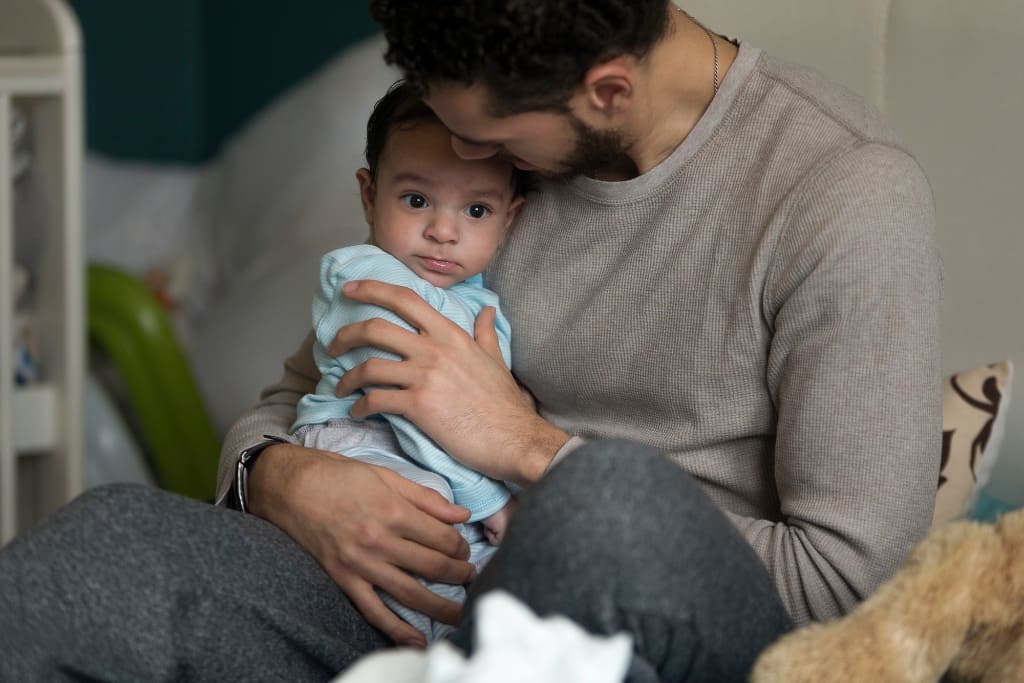 Toddler With His Dad