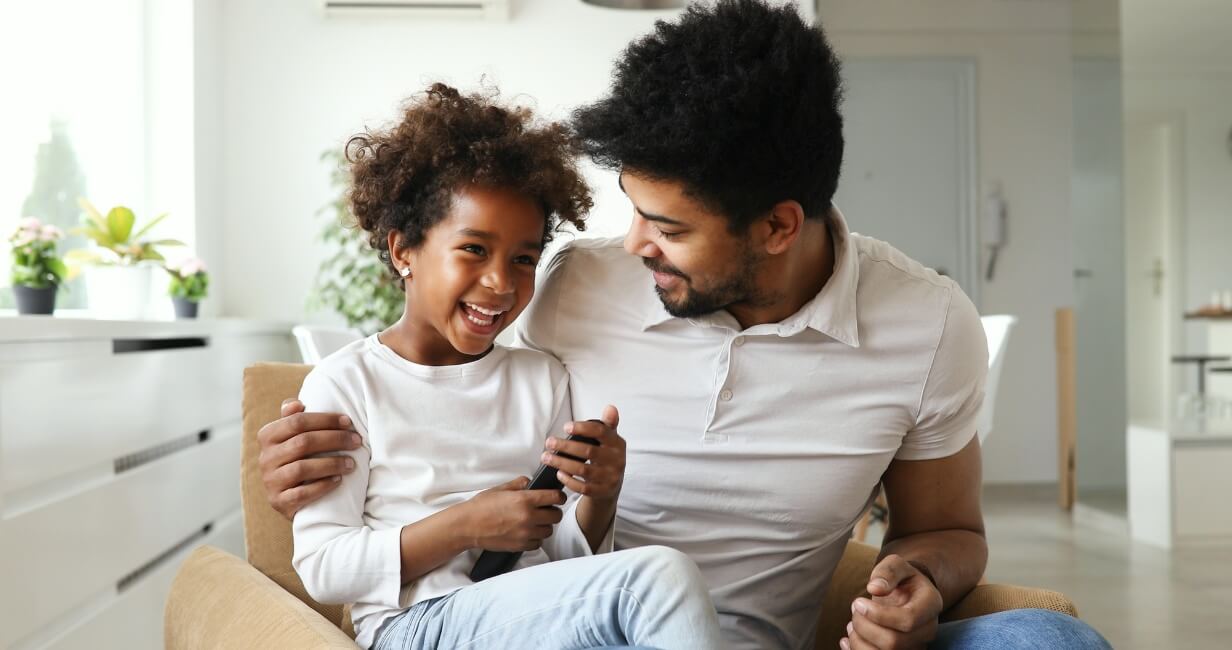 Daughter Smiling With Her Dad